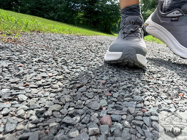 Walking on a mixed gravel path during summer conditions, no noted ankle instability.