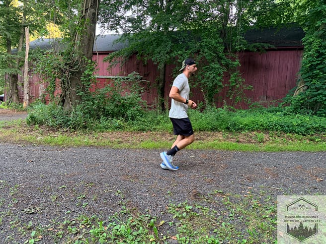 Trail running with forerunner 970 on wrist, noting our multi-activity objective testing