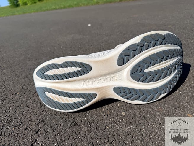 Entire outsole view. Thinner traction islands on midportion of shoe