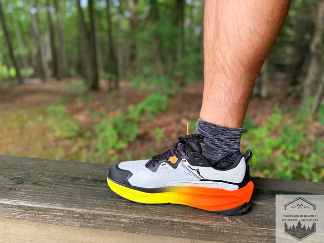 Altra Olympus 7 while standing on a bench