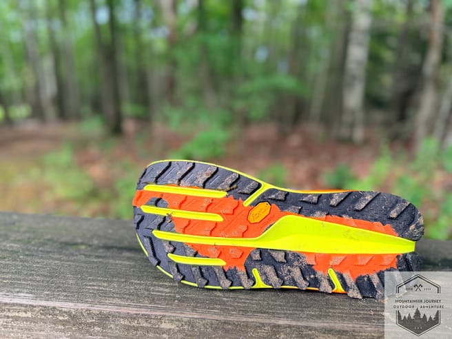 View of outsole on Olympus 7, with dirt embedded into lugs after testing