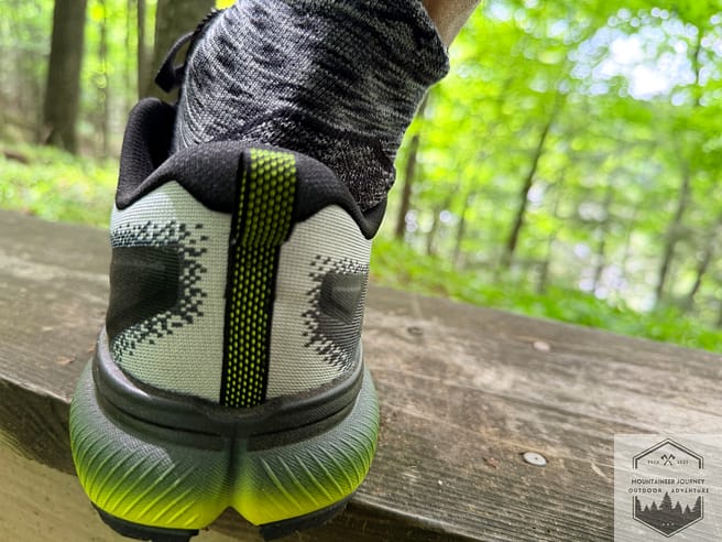 Heel view of the cascadia 20 noting the lower heel cuff