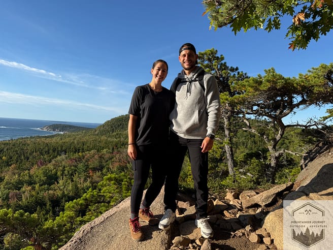 At the top of Beehive trail summit, view of mountains in background