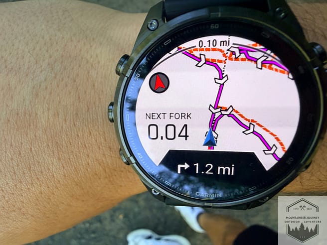 Next Fork navigation showing the next right turn is in 1.2 miles on the Fenix 9 watch.