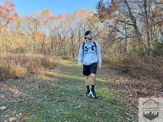 Walking on trail with backpack