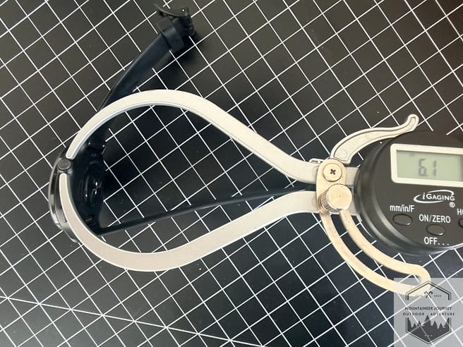 Measuring the vivoactive 6 button at 6.1mm with our caliper