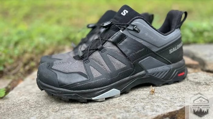 Salomon X Ultra 4 low sitting on wall highlighting the side