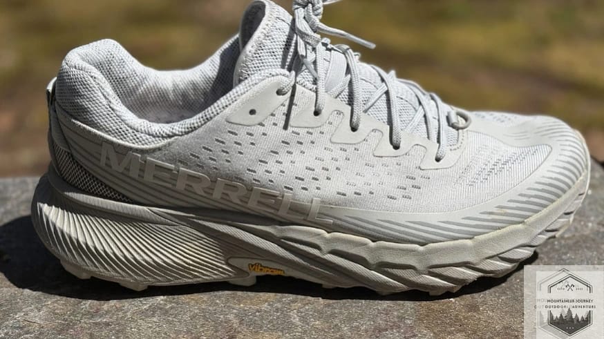 Lateral view of the Merrell Agility Peak 5 showing the breathable engineered mesh upper and the high-traction Vibram Megagrip outsole.