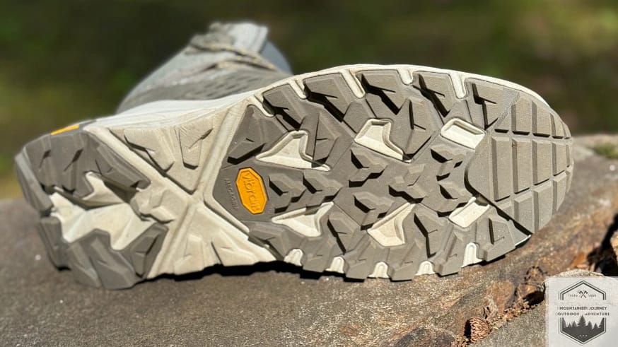 outsole view of the boot, multi-directional lugs