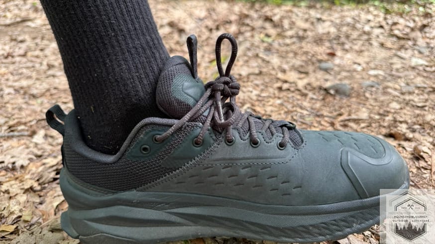 Ankle view of the Altra Olympus 6 highlighting the Original FootShape fit for natural toe splay and the plush, updated ankle collar for heel security.