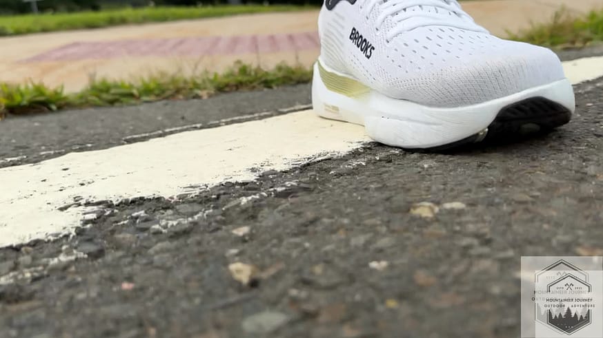 Brooks Ghost Max 3 transitioning from concrete to asphalt to test the smooth ride of the GlideRoll Rocker geometry