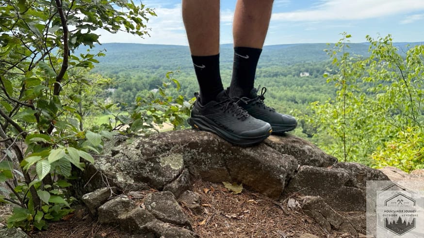 Wearing the Ultra Olympus 6 at the top of mountain summit