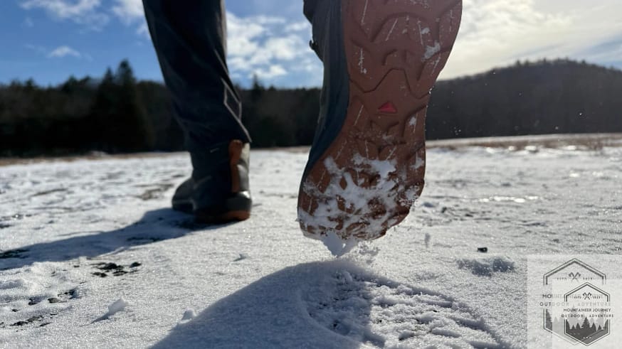Elxir Activ's Contagrip outsole biting into snow and gravel during testing