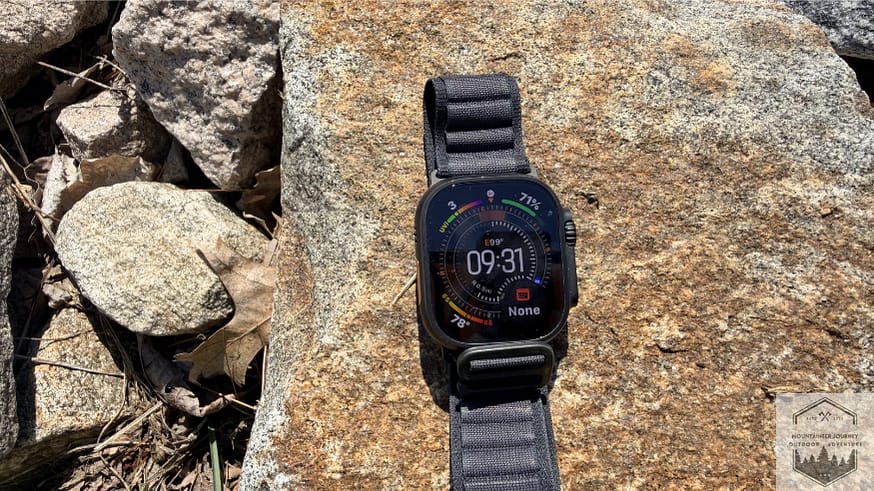View Of Apple Watch Ultra 3 Face revealing the time in multiple features that are customizable for weather, navigation, battery