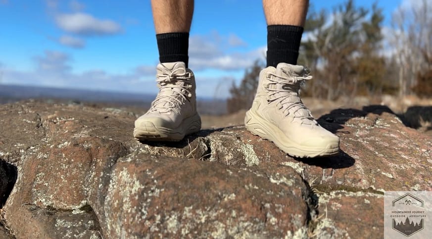 Wearing The Hoka Kaha 3's on a rock highlighting the front of the boots