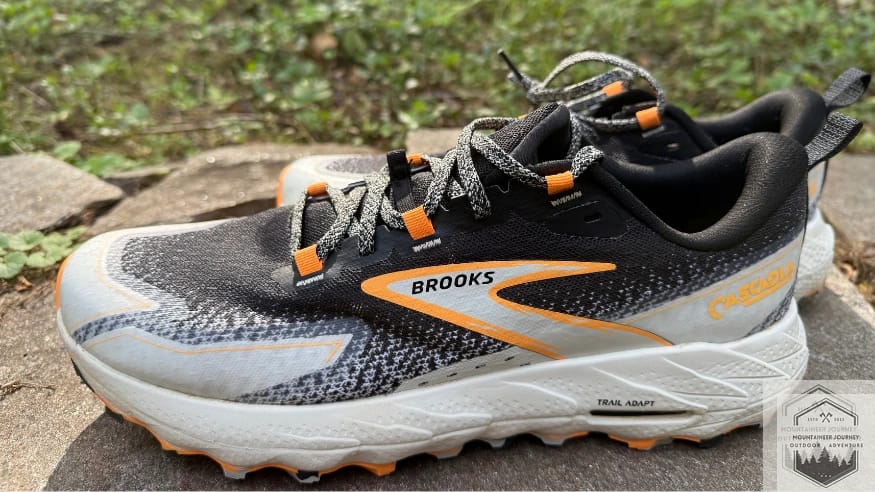 Side view of the brooks cascadia 18 sitting on a wall