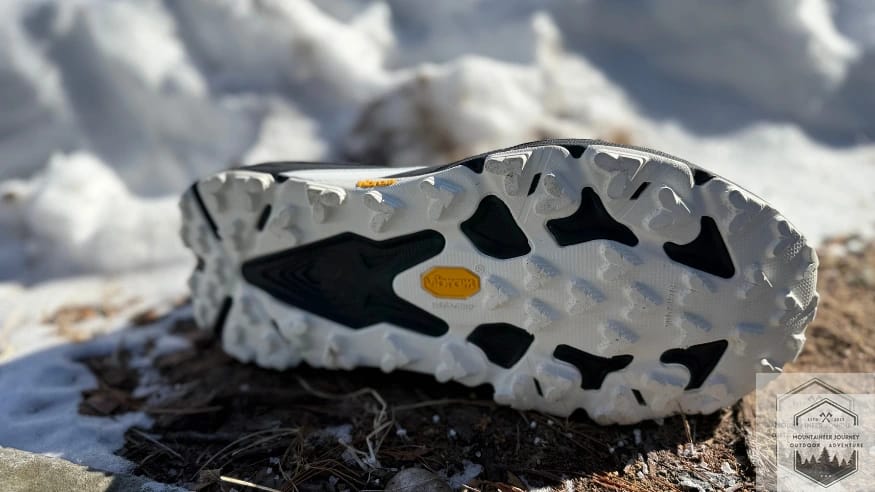 View of the Vibram megagrip outsole with rubber microspikes
