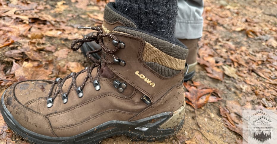 Lowa Renegade covered in mud on leaves